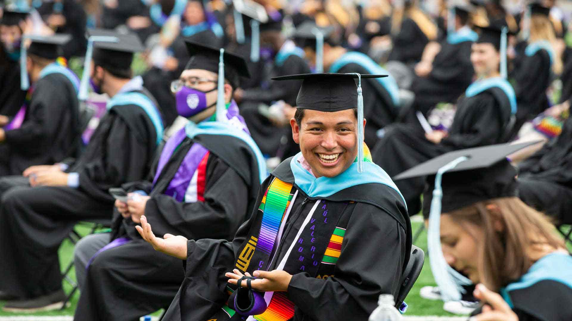 Student smiles at graduation 