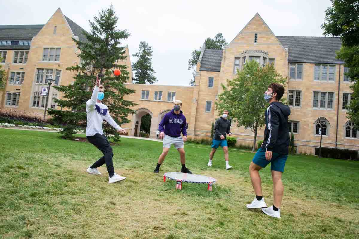 Students play a game on campus