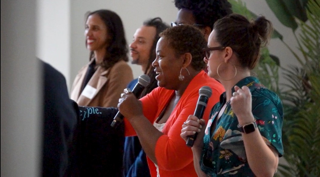 Group of speakers with microphones