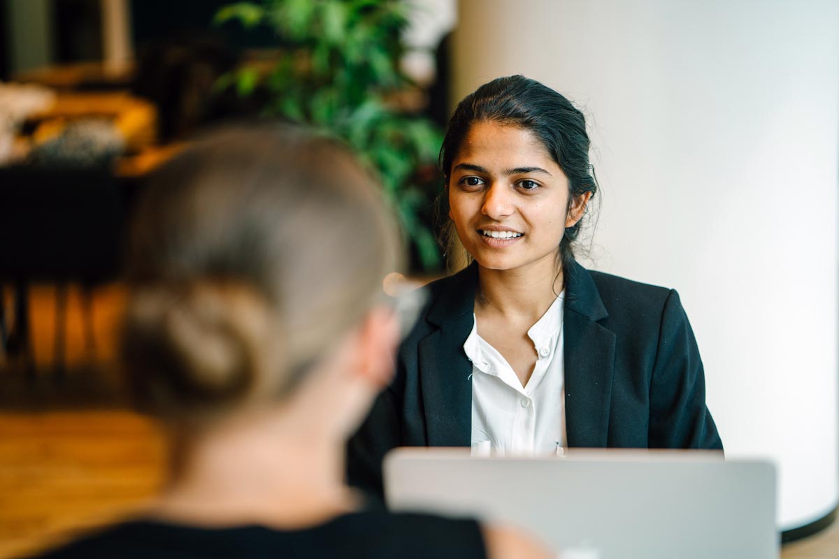 individual smiles during an interview