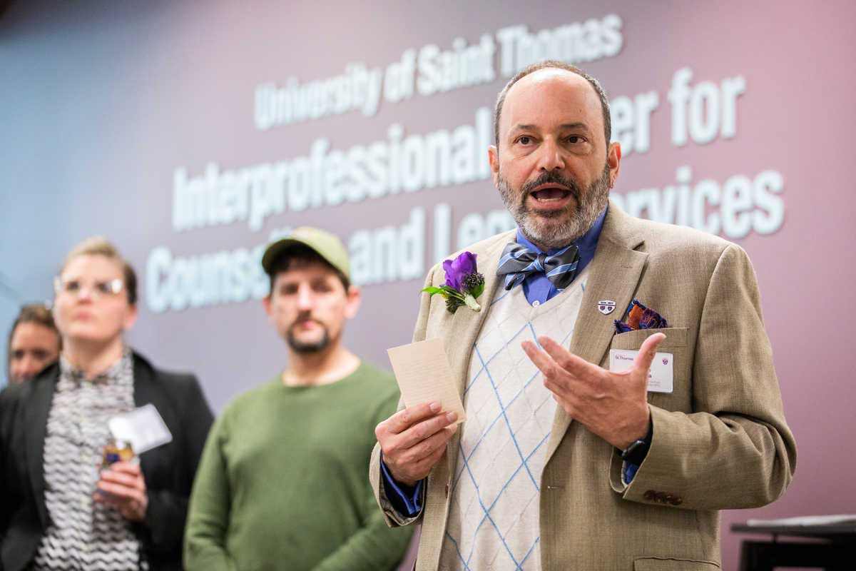 Director speaks during an event.