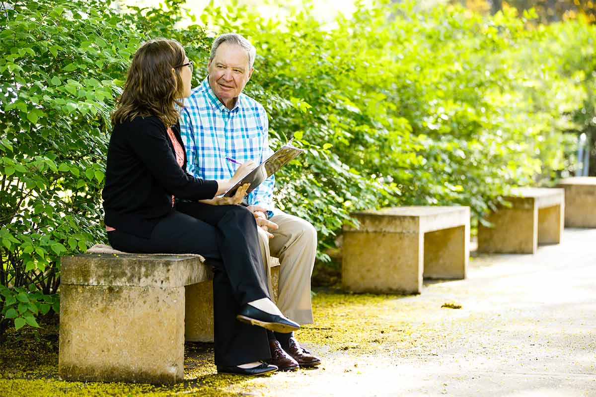 social worker talks to an individual