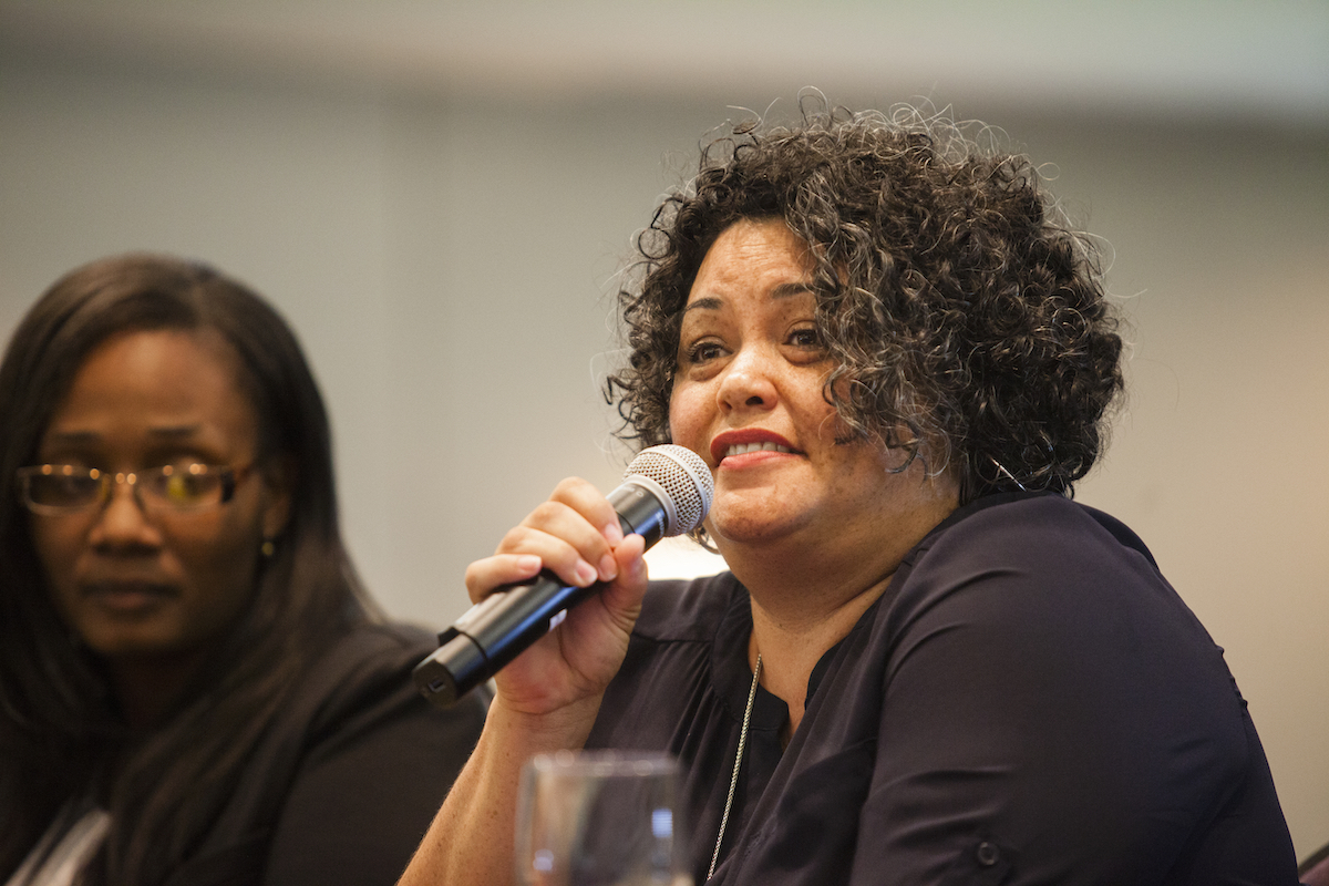 Members of the Field Practice Institute answer questions on a panel