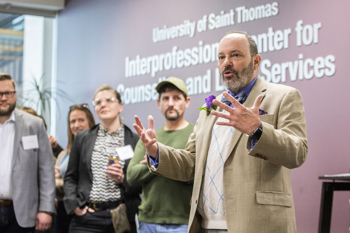 Professor George Baboila gives a speech at the Interprofessional Center for Counseling and Legal Services