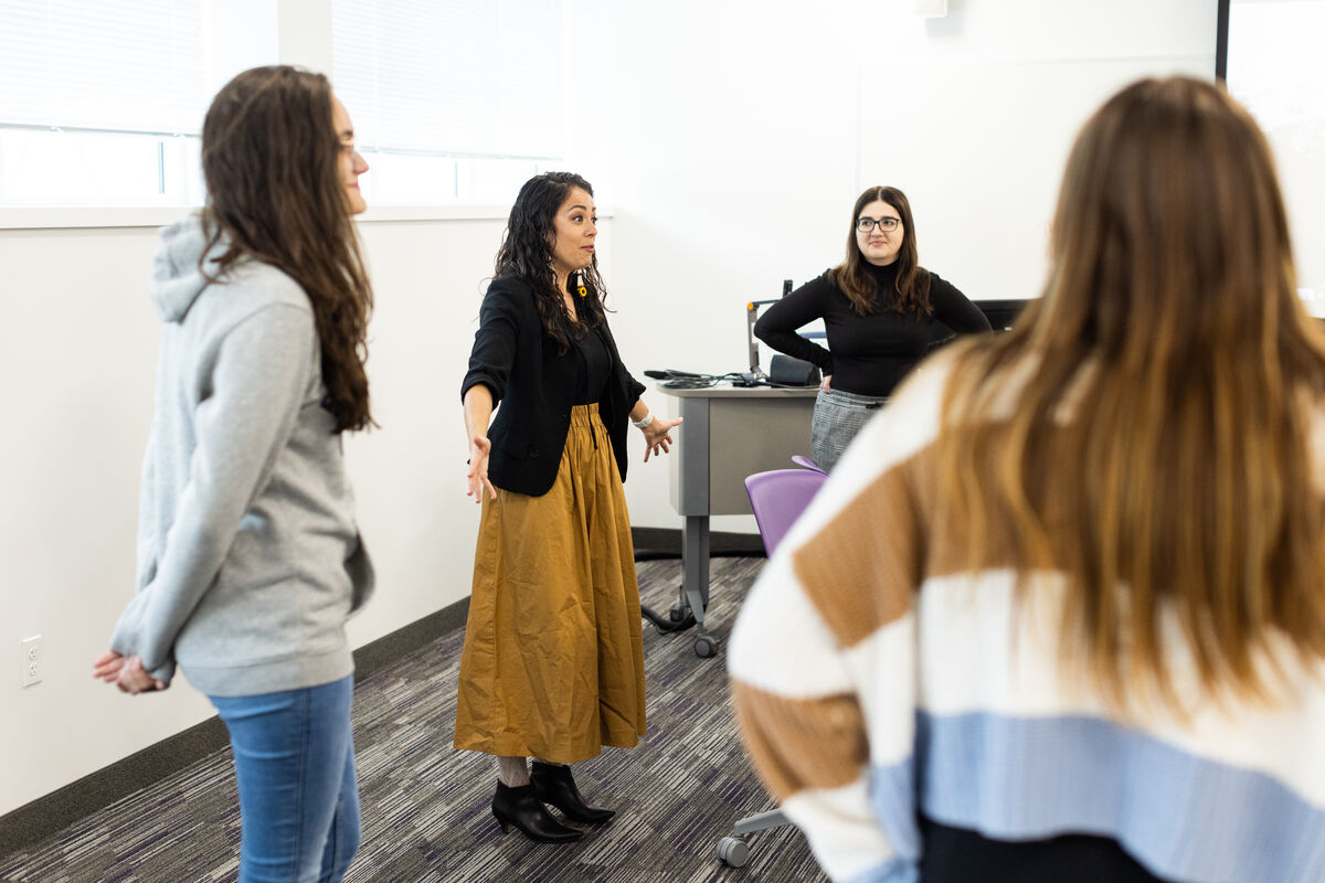 Professor Alicia Powers teaching students