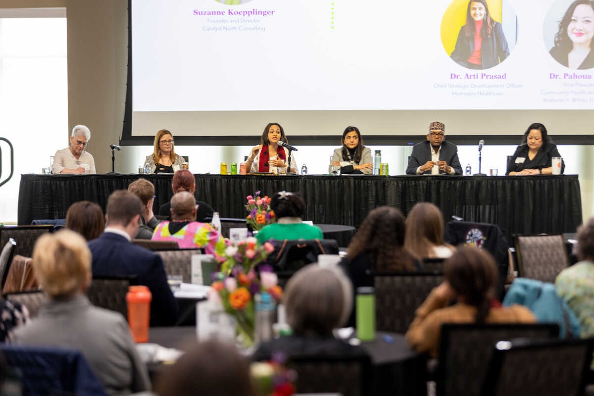 Panel speaking at an event