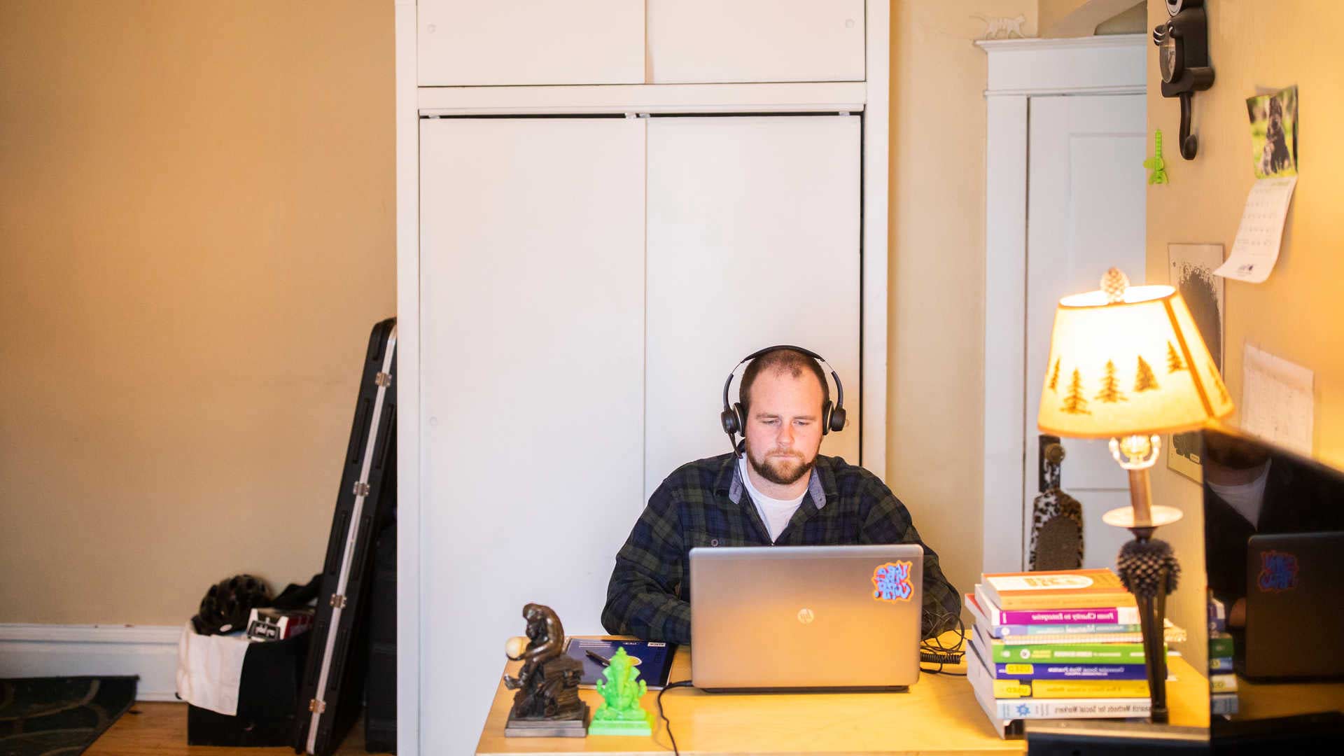 School of Social Work grad student works on computer. 