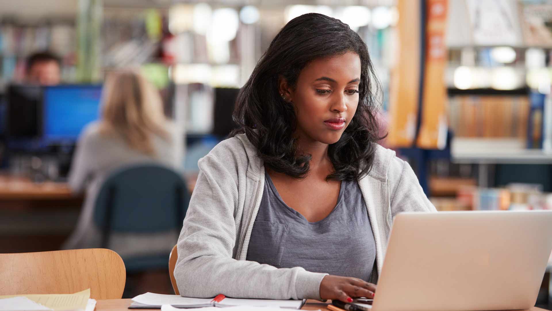 Student works on computer.