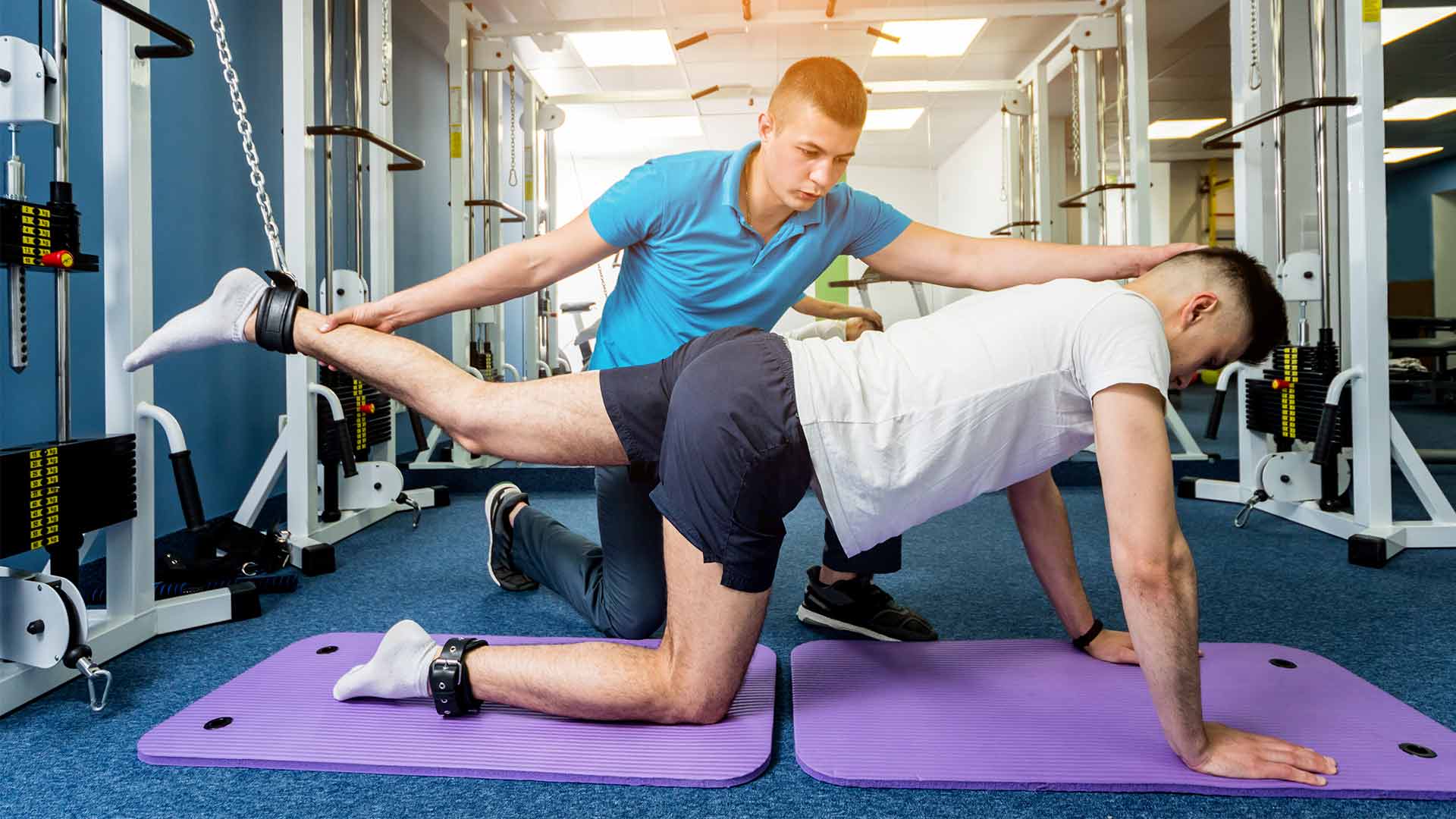 Physical therapist works with a patient