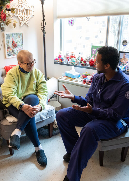 Nurse speaking with patient