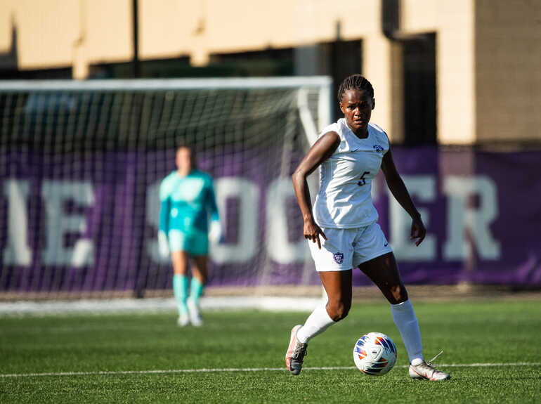 Women playing soccer