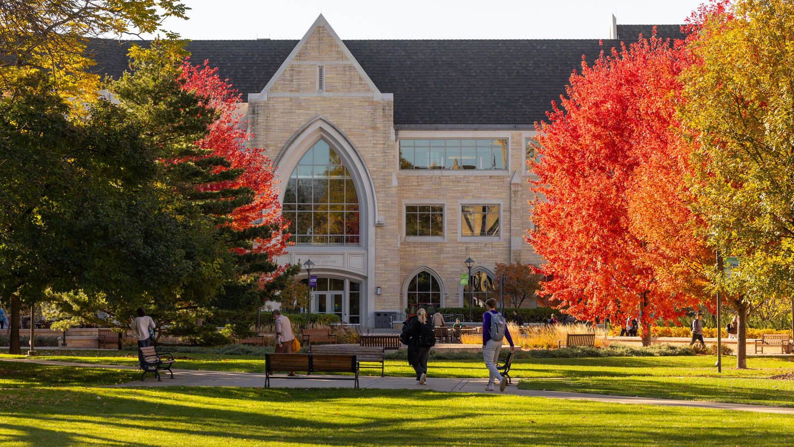 Campus building and fall color trees